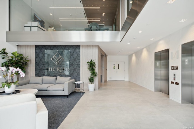 218 Middle Neck Rd Unit 301, Great Neck, NY 11021 - community lobby featuring a high ceiling and recessed lighting