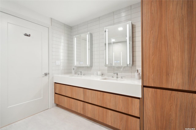 bathroom with backsplash and vanity