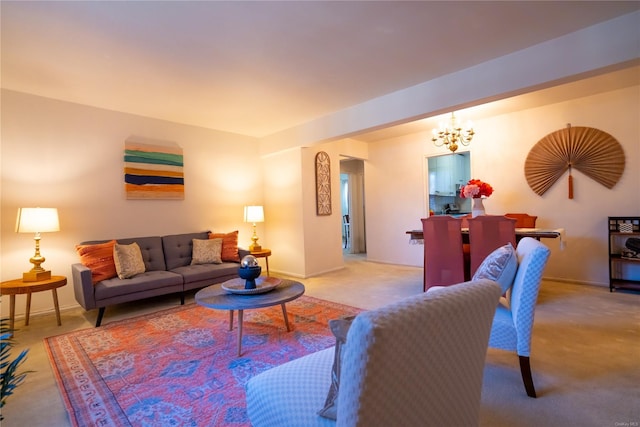 living room with light carpet and an inviting chandelier