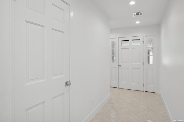 interior space featuring light parquet flooring