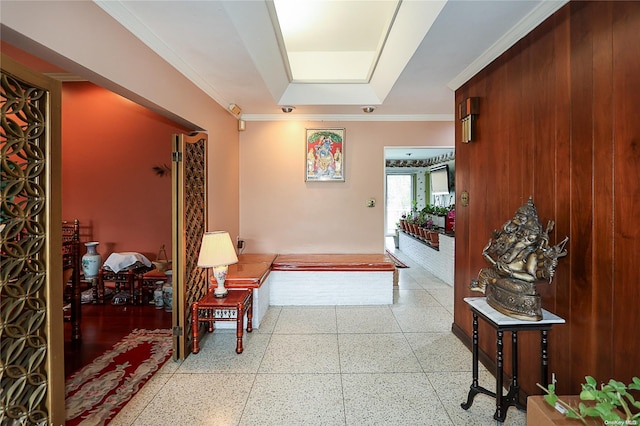 hallway featuring ornamental molding