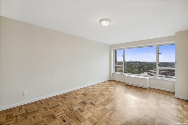 166-25 Powells Cove Blvd Unit 8D, Beechhurst, NY 11357 - unfurnished room featuring baseboards