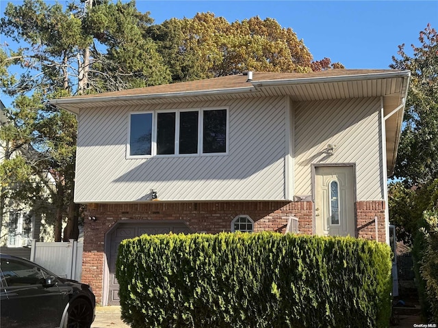 view of front of home with a garage