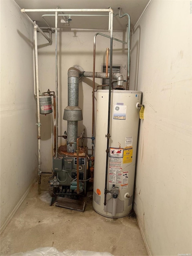 utility room with water heater