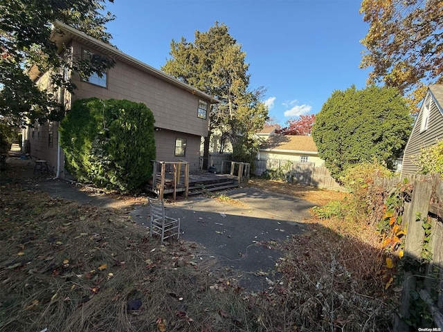 view of home's exterior with a deck