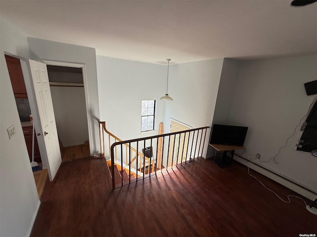 staircase featuring hardwood / wood-style floors