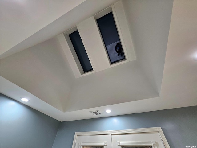 room details with recessed lighting and visible vents