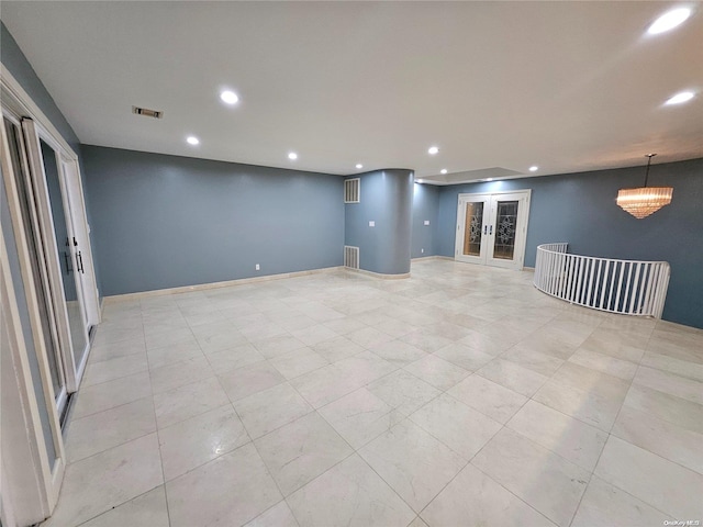 interior space featuring recessed lighting, baseboards, and visible vents