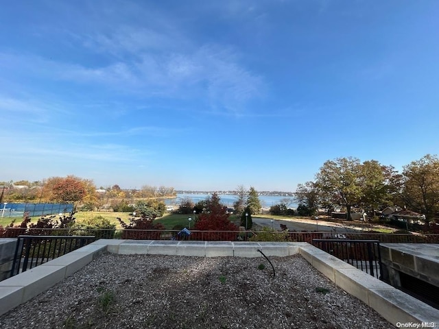 view of yard with a water view