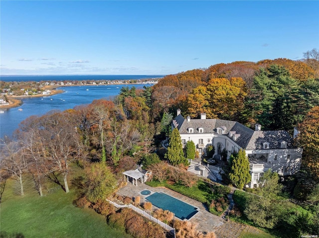 birds eye view of property featuring a water view