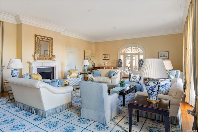 living room with light wood-type flooring and ornamental molding