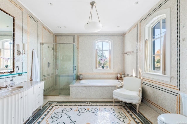 bathroom featuring separate shower and tub, tile patterned flooring, and vanity