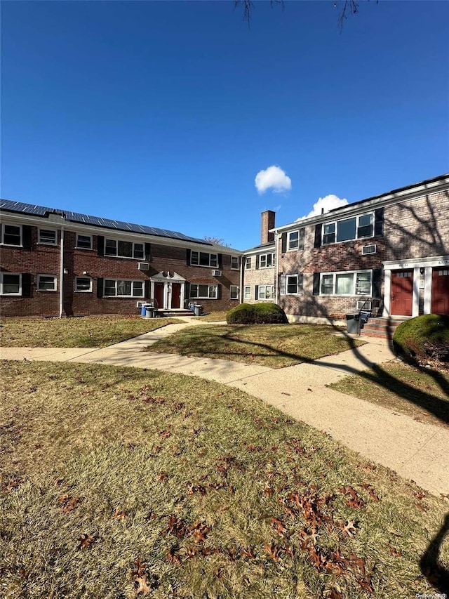 exterior space with a lawn