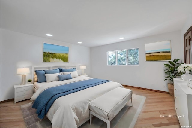 bedroom with light hardwood / wood-style floors