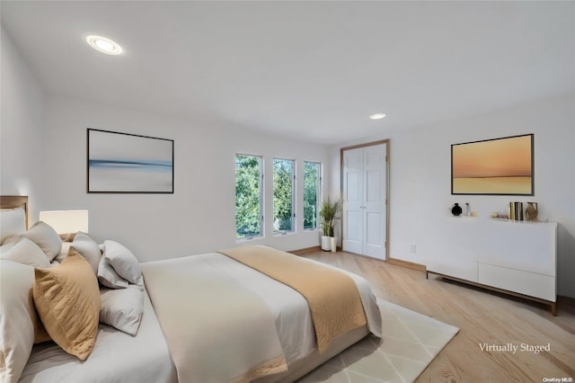 bedroom featuring light hardwood / wood-style flooring