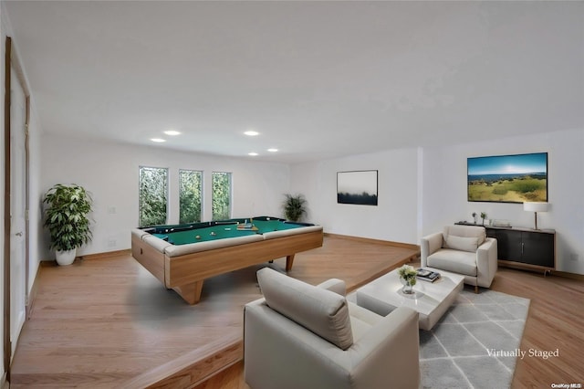 rec room featuring light wood-type flooring and billiards