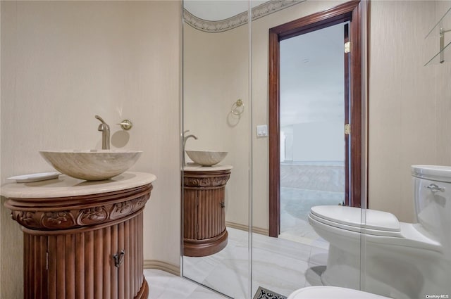 bathroom with vanity and toilet