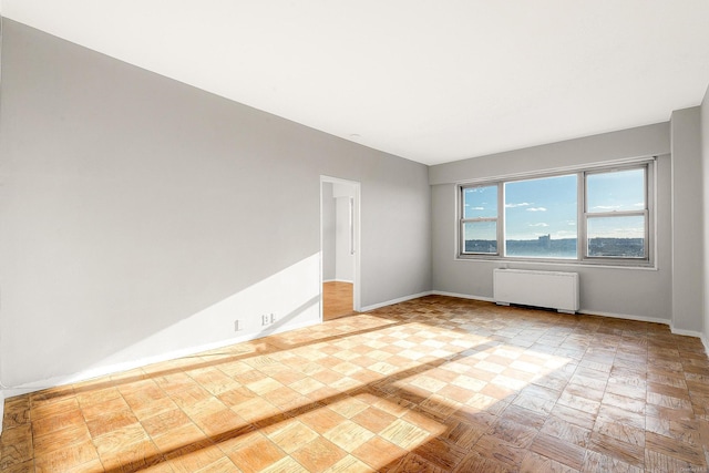 empty room featuring radiator