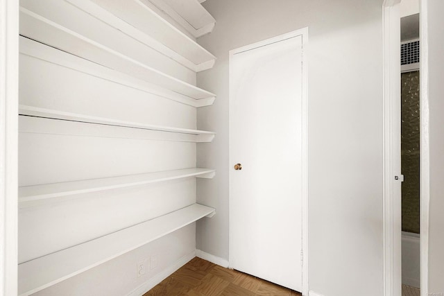 interior space featuring parquet floors