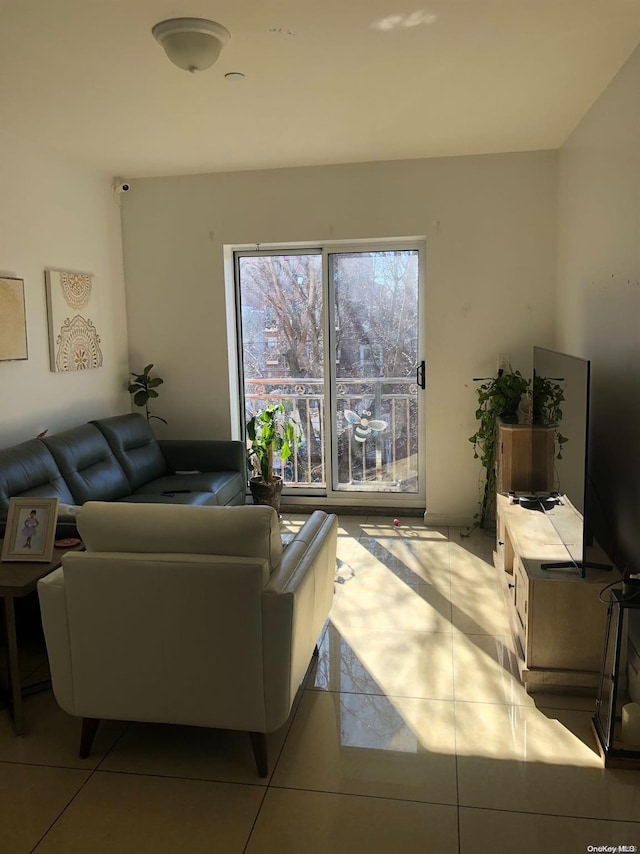 living room featuring light tile patterned flooring