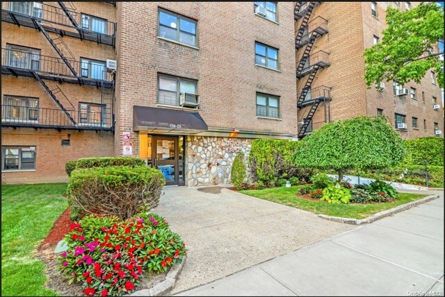 138-25 31st Dr Unit 3E, Flushing, NY 11354 - view of apartment building / complex featuring cooling unit