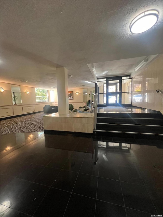 138-25 31st Dr Unit 3E, Flushing, NY 11354 - reception area with a textured ceiling