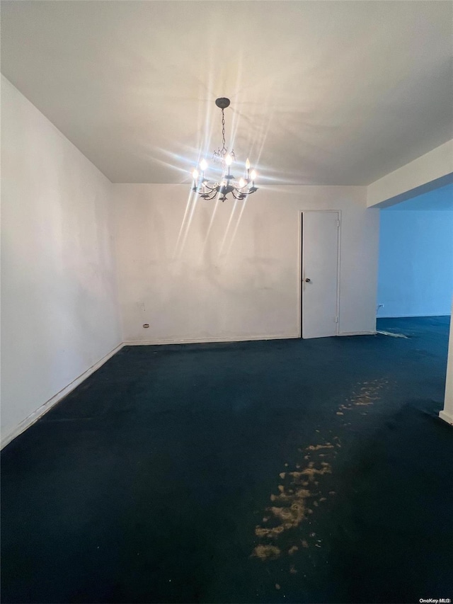 138-25 31st Dr Unit 3E, Flushing, NY 11354 - spare room featuring a chandelier