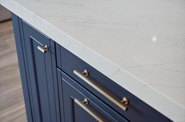 details featuring blue cabinetry