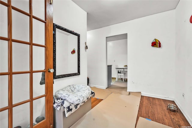 corridor featuring light hardwood / wood-style flooring