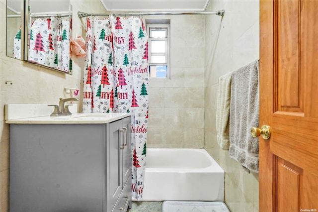 bathroom featuring vanity and shower / bath combo with shower curtain