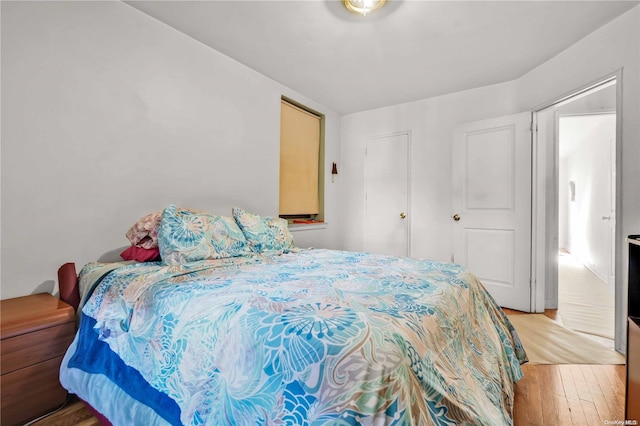 bedroom with light hardwood / wood-style flooring