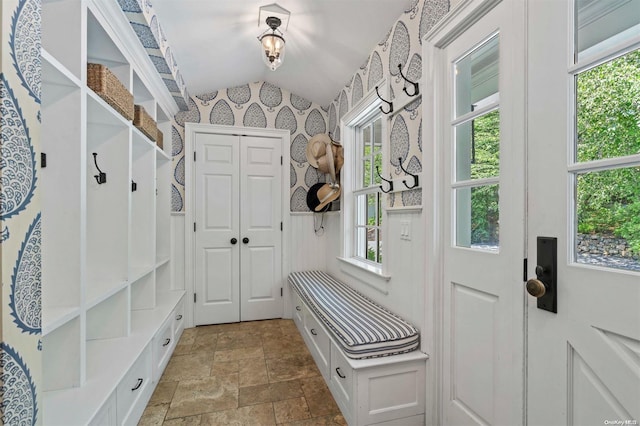 mudroom featuring lofted ceiling