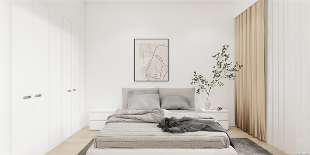 136-80 41st Ave Unit 6G, Flushing, NY 11355 - bedroom with light wood finished floors