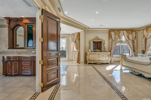 bedroom featuring crown molding