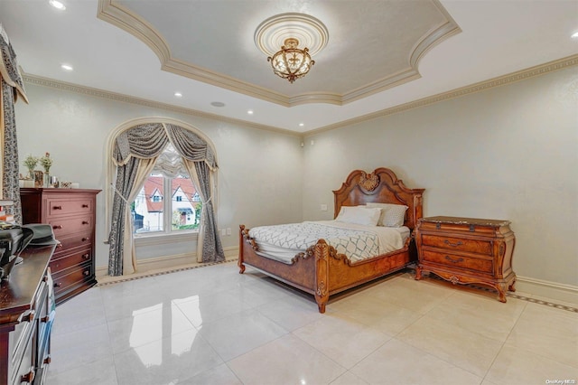 bedroom with light tile patterned flooring, crown molding, and a tray ceiling