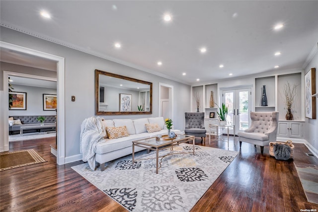 living room featuring crown molding, dark hardwood / wood-style flooring, and french doors