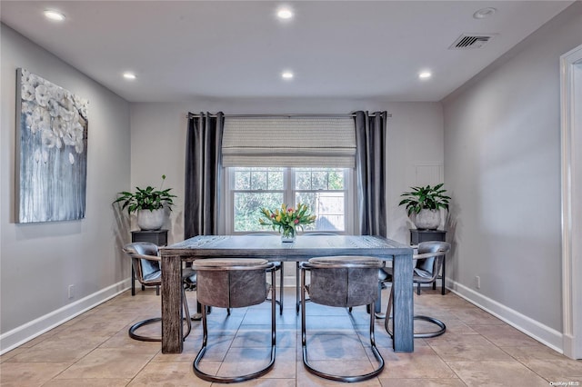 view of tiled dining space