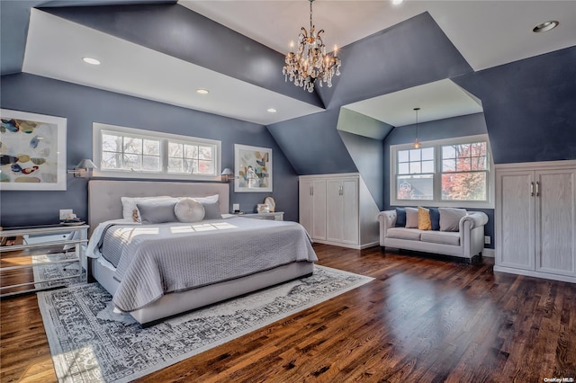 bedroom featuring multiple windows, dark wood-type flooring, and a notable chandelier