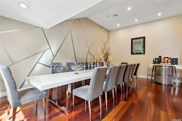 dining space featuring dark hardwood / wood-style flooring