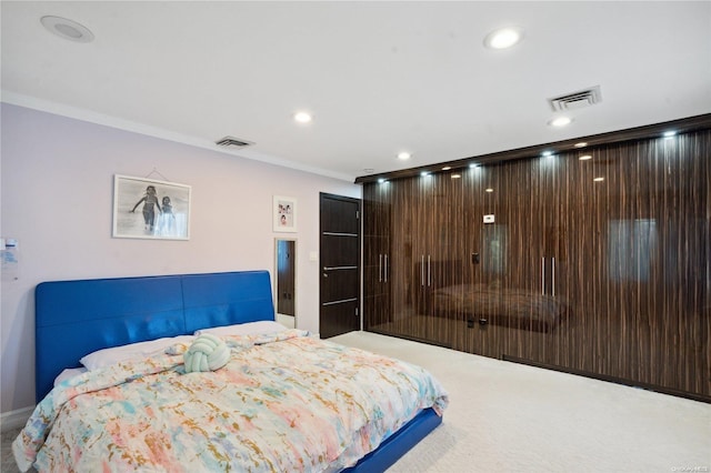 bedroom with carpet and ornamental molding