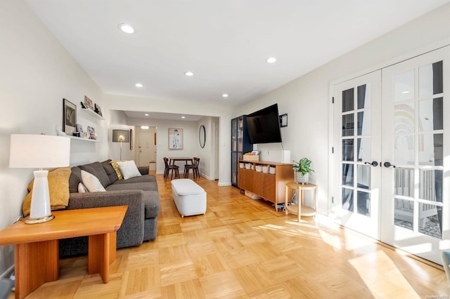 living room featuring french doors and light parquet floors