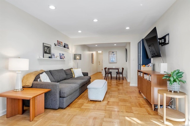 living room featuring light parquet floors