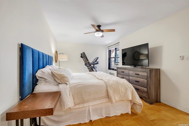 bedroom featuring light parquet floors and ceiling fan