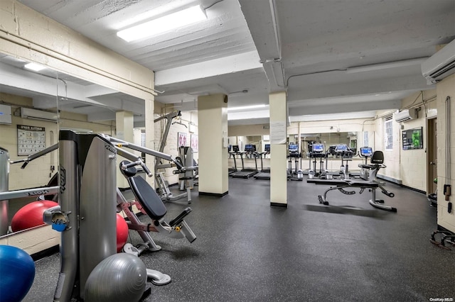 gym with a wall mounted air conditioner