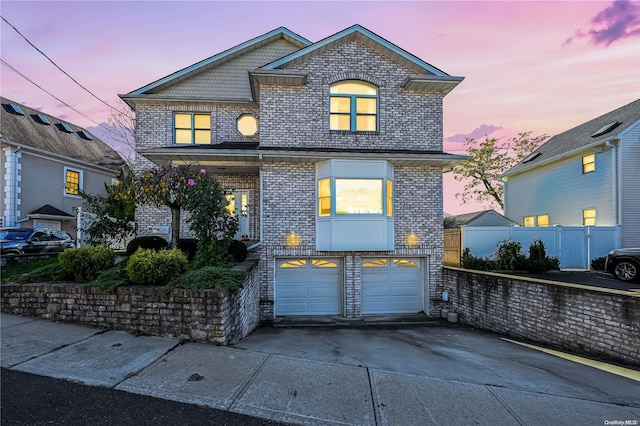 view of front of home with a garage