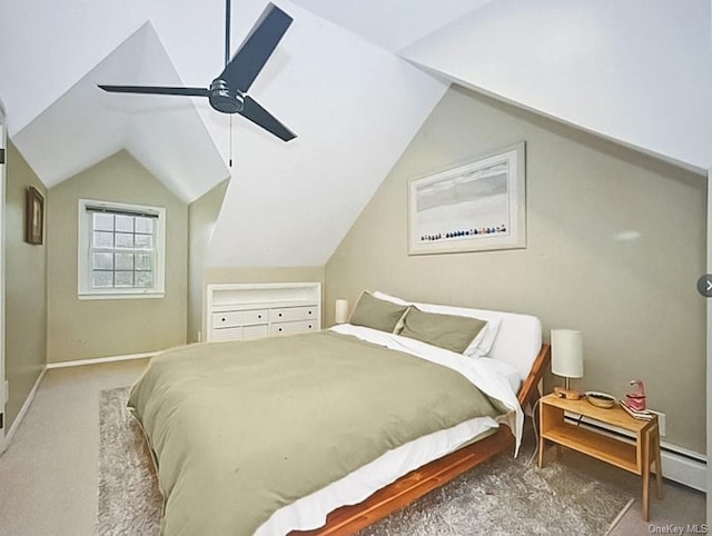 carpeted bedroom with ceiling fan and vaulted ceiling