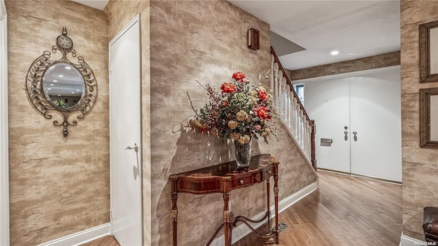 hallway featuring hardwood / wood-style floors