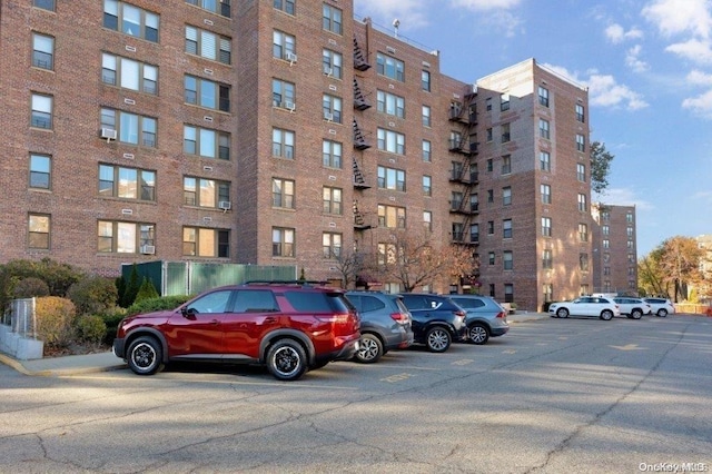 18-75 Corporal Kennedy St Unit 2F, Bayside, NY 11360 - view of apartment building / complex with uncovered parking