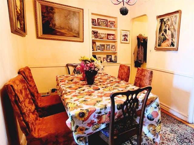 dining area featuring built in features