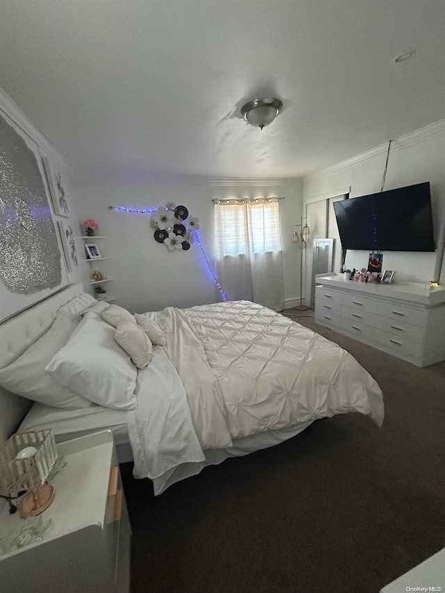 carpeted bedroom featuring ornamental molding